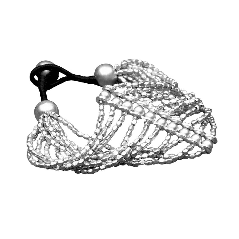 Artisan handmade silver striped multi strand, elegantly beaded bracelet designed by OMishka. 