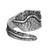 An adjustable, chunky, artisan handmade solid silver, swirl patterned wrap ring designed by OMishka.