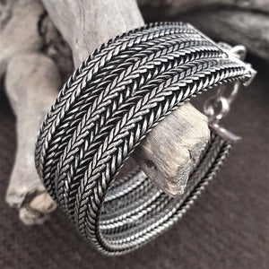 Artisan handmade silver toned brass, chunky triple braided foxtail chain bracelet designed by OMishka.