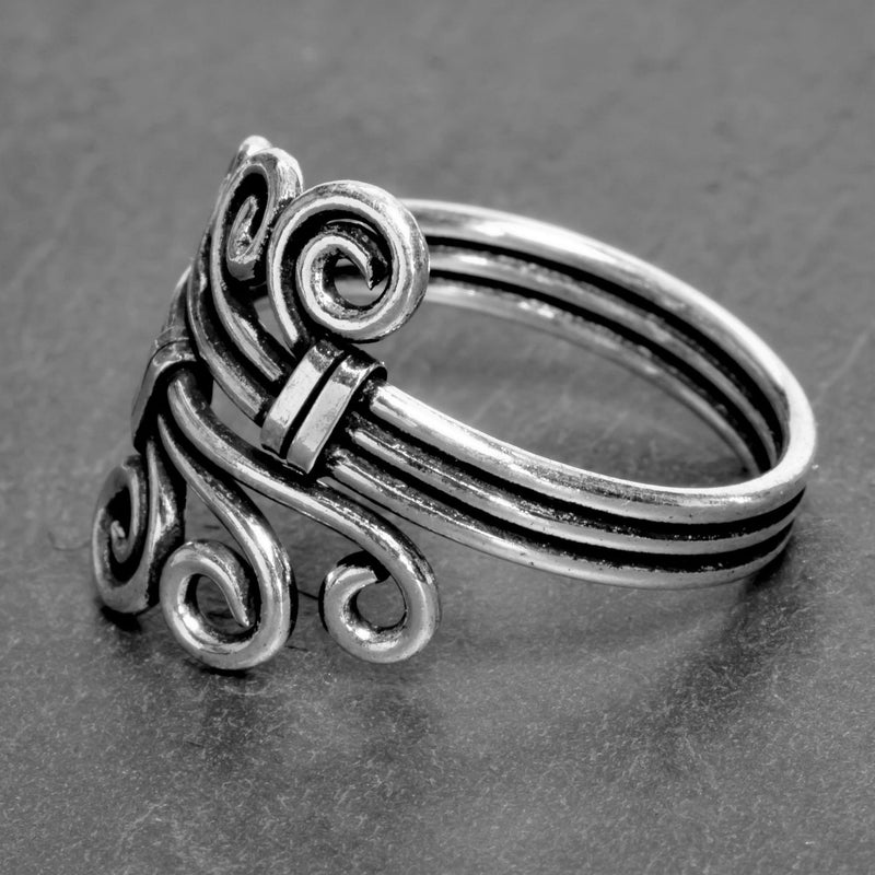 An adjustable, artisan handmade, solid silver triple wave wrap ring designed by OMishka.
