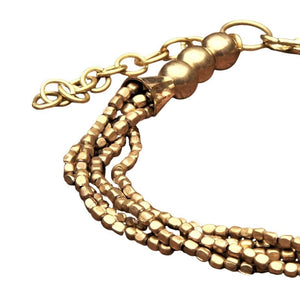 Artisan handmade, simple pure brass beaded multi strand, adjustable bracelet designed by OMishka.