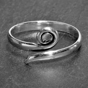 A simple, artisan handmade solid silver, single spiral wrap ring designed by OMishka.