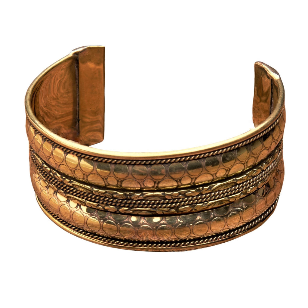 An artisan handmade pure brass, spotty patterned and coiled striped cuff bracelet designed by OMishka.