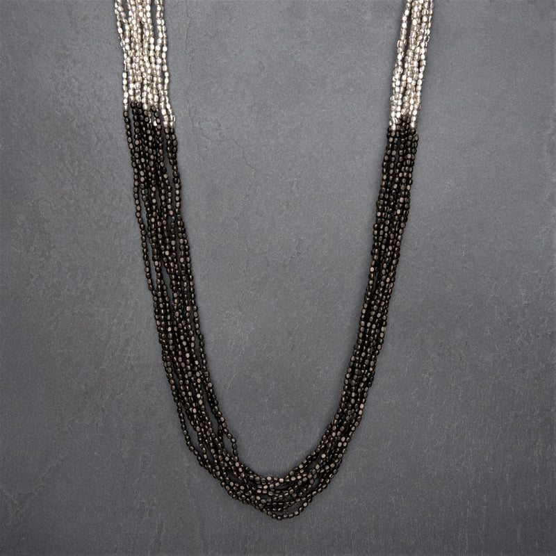Artisan handmade, striped silver toned and black brass, beaded multi strand necklace designed by OMishka.