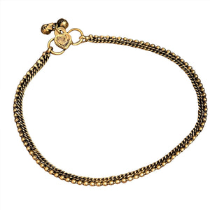 An artisan handmade, thin beaded pure brass anklet with tiny bells designed by OMishka.