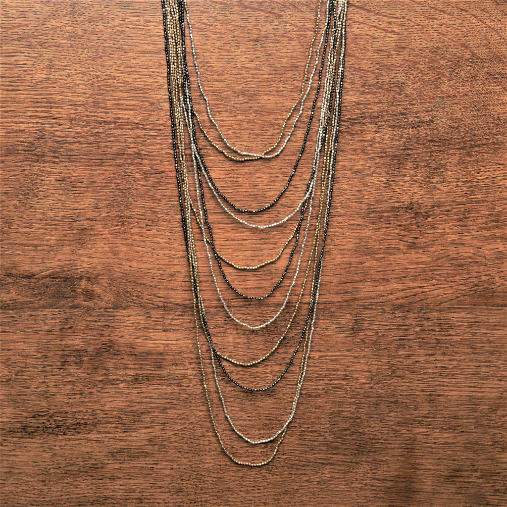 Handmade three tone, tiny cube beaded, long multi layered necklace designed by OMishka.
