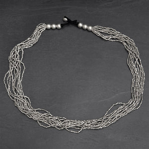 Artisan handmade silver toned brass, simple and elegant tiny cube beaded multi strand necklace designed by OMishka.
