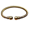 An artisan handmade, twisted pure brass rope bracelet designed by OMishka.