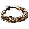 Artisan handmade two tone, golden and black brass beaded, woven multi strand bracelet designed by OMishka.