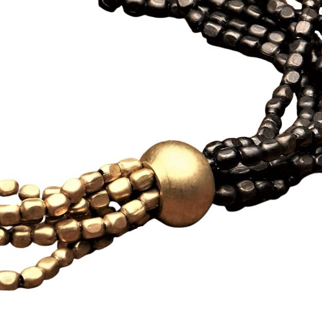 Artisan handmade two tone, golden and oxidised black brass, tiny beaded multi strand bracelet designed by OMishka.