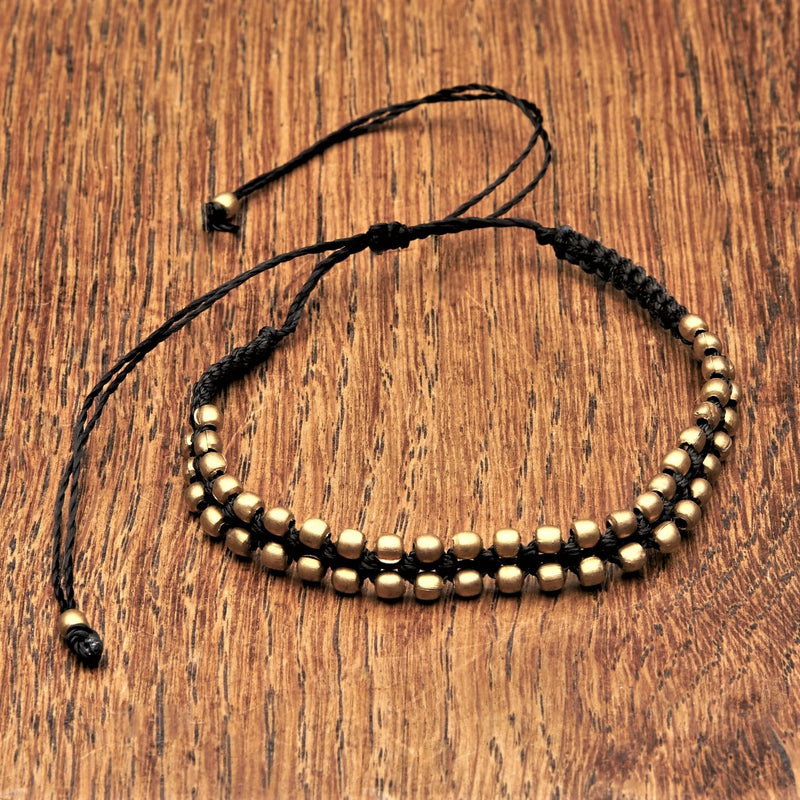 Artisan handmade pure brass beaded, woven black cord adjustable drawstring, dainty bracelet designed by OMishka.