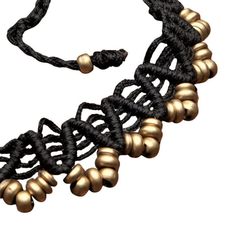 A strong, black macrame weave, pure brass beaded ankle bracelet designed by OMishka.