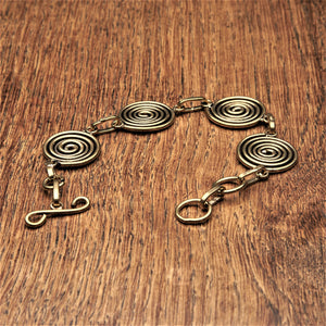 Adjustable, handmade pure brass, 4 simple infinity spirals, chain linked bracelet designed by OMishka.