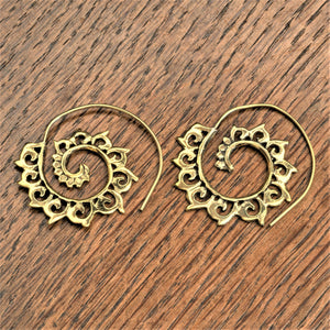 Chunky, handmade pure brass, crested ocean wave detailed spiral hoop earrings designed by OMishka.