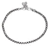 A chunky, nickel free solid silver box chain anklet with tiny bells designed by OMishka.