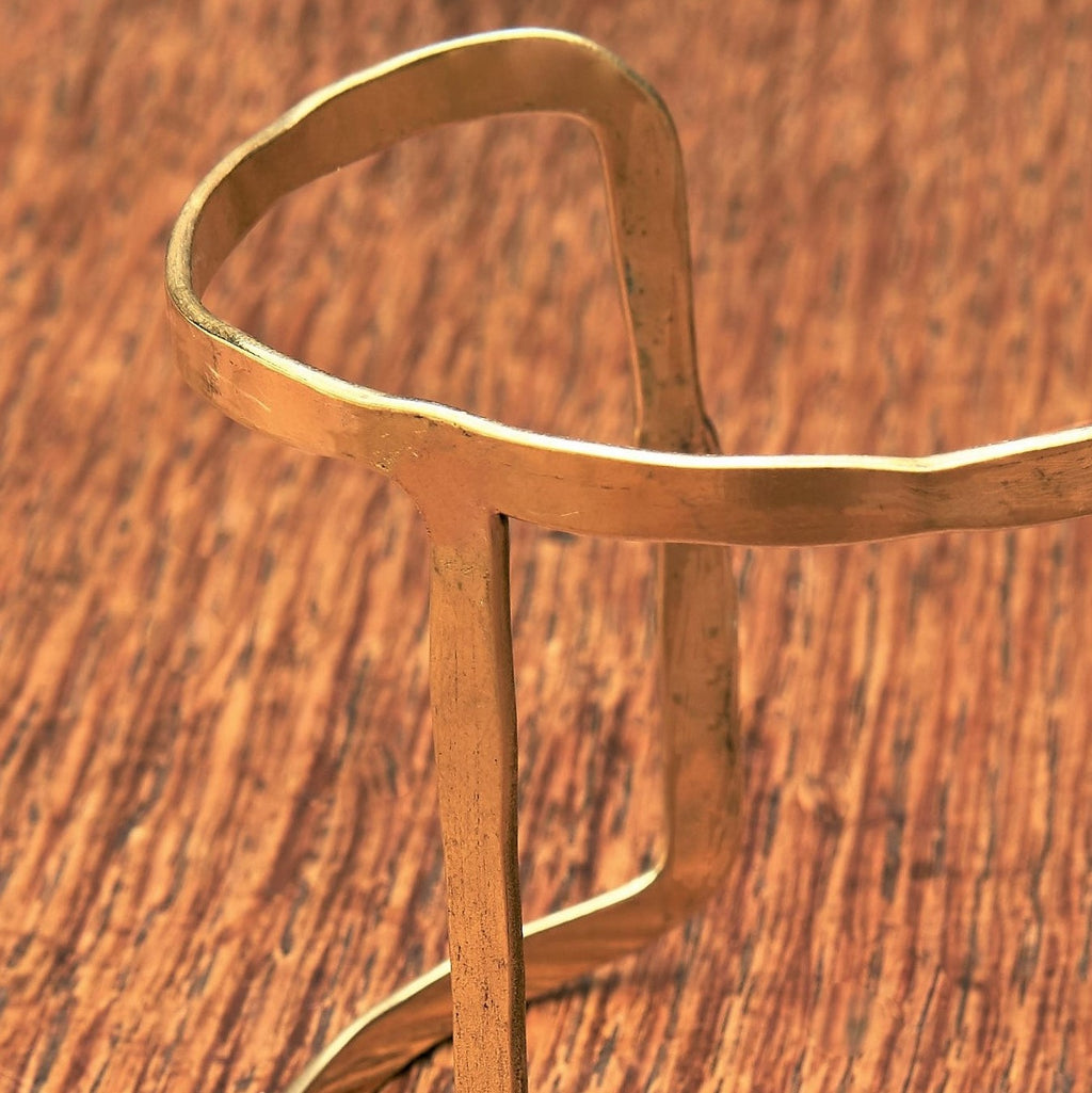 A unique, cut out H shaped adjustable pure brass cuff bracelet designed by OMishka.