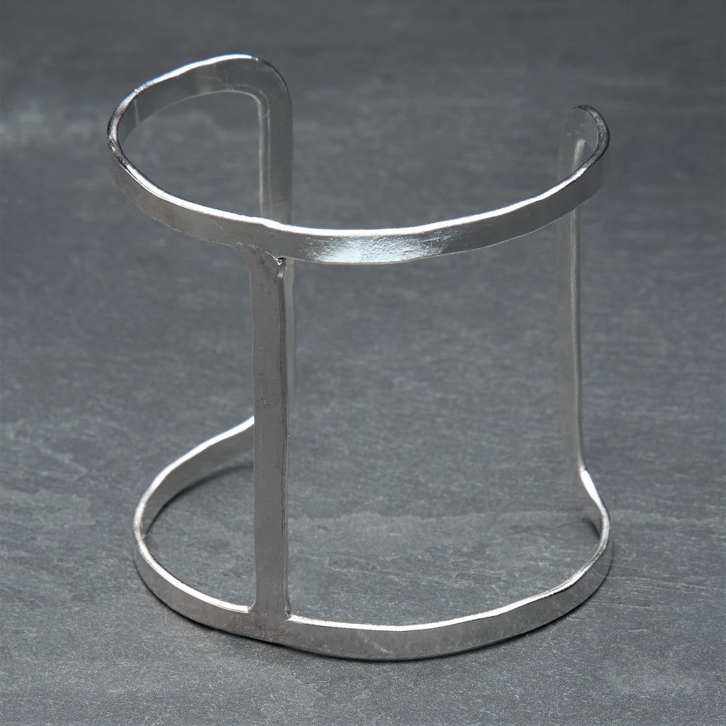 A unique cut out H shaped, adjustable silver cuff bracelet designed by OMishka.
