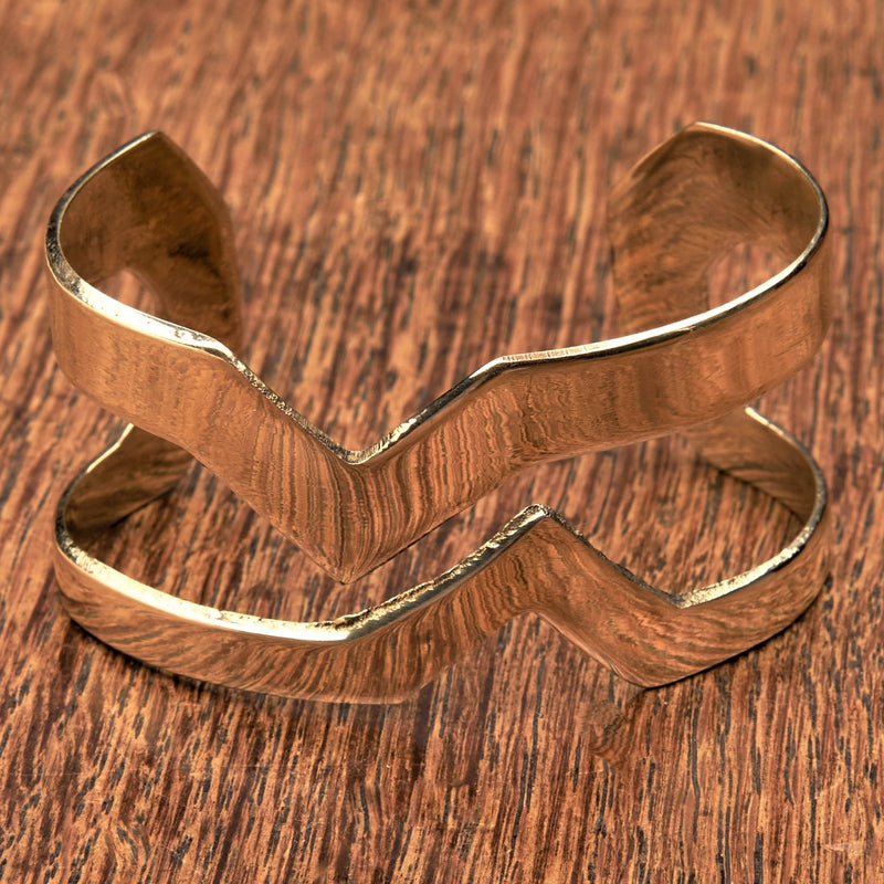 A chunky cut out zig zag, adjustable pure brass cuff bracelet designed by OMishka.