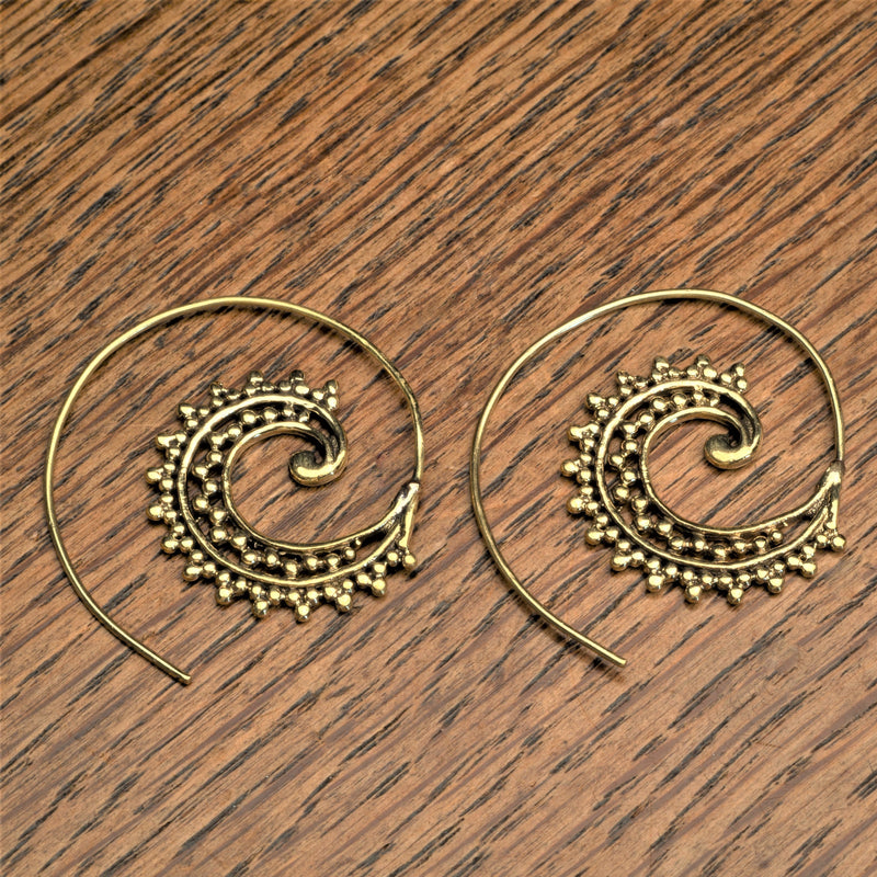 Handmade pure brass, dainty, decorative, dotted spiral hoop earrings designed by OMishka.
