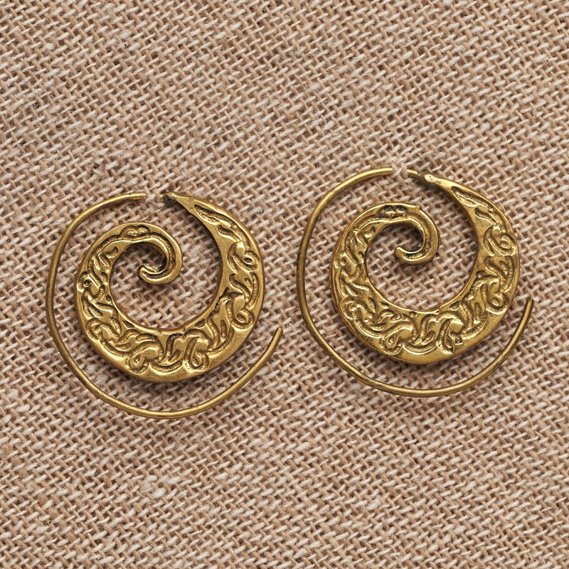Handmade nickel free pure brass, dainty swirl patterned spiral hoop earrings designed by OMishka.