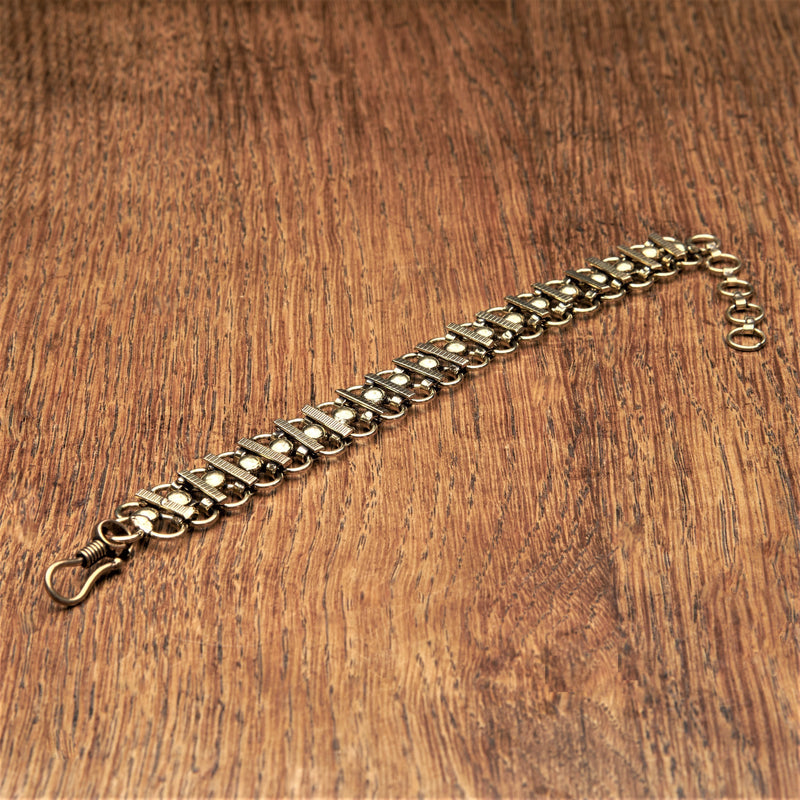 Banjara gypsy, golden toned brass, decorative beaded infinity link chainmail bracelet designed by OMishka.
