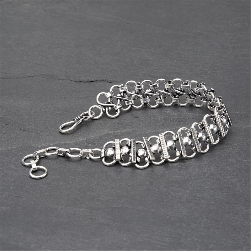 Banjara gypsy, silver toned brass, decorative beaded infinity link chainmail bracelet designed by OMishka.