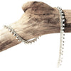 A simple, solid silver fine beaded ankle bracelet designed by OMishka.