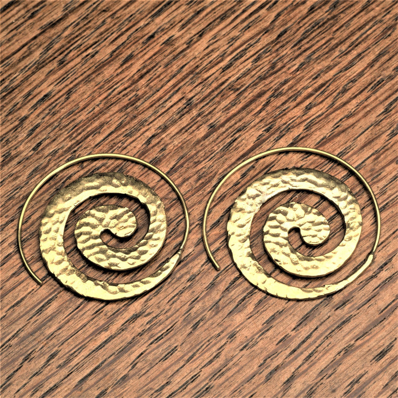 Handmade pure brass, flat, dimpled textured spiral hoop earrings designed by OMishka.