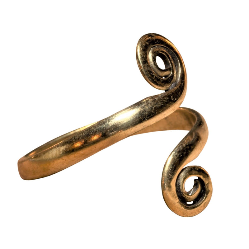 A dainty, handmade, adjustable pure brass open spiral wrap toe ring designed by OMishka.
