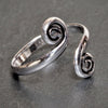 A dainty, adjustable, handmade solid silver open spiral wrap toe ring designed by OMishka.