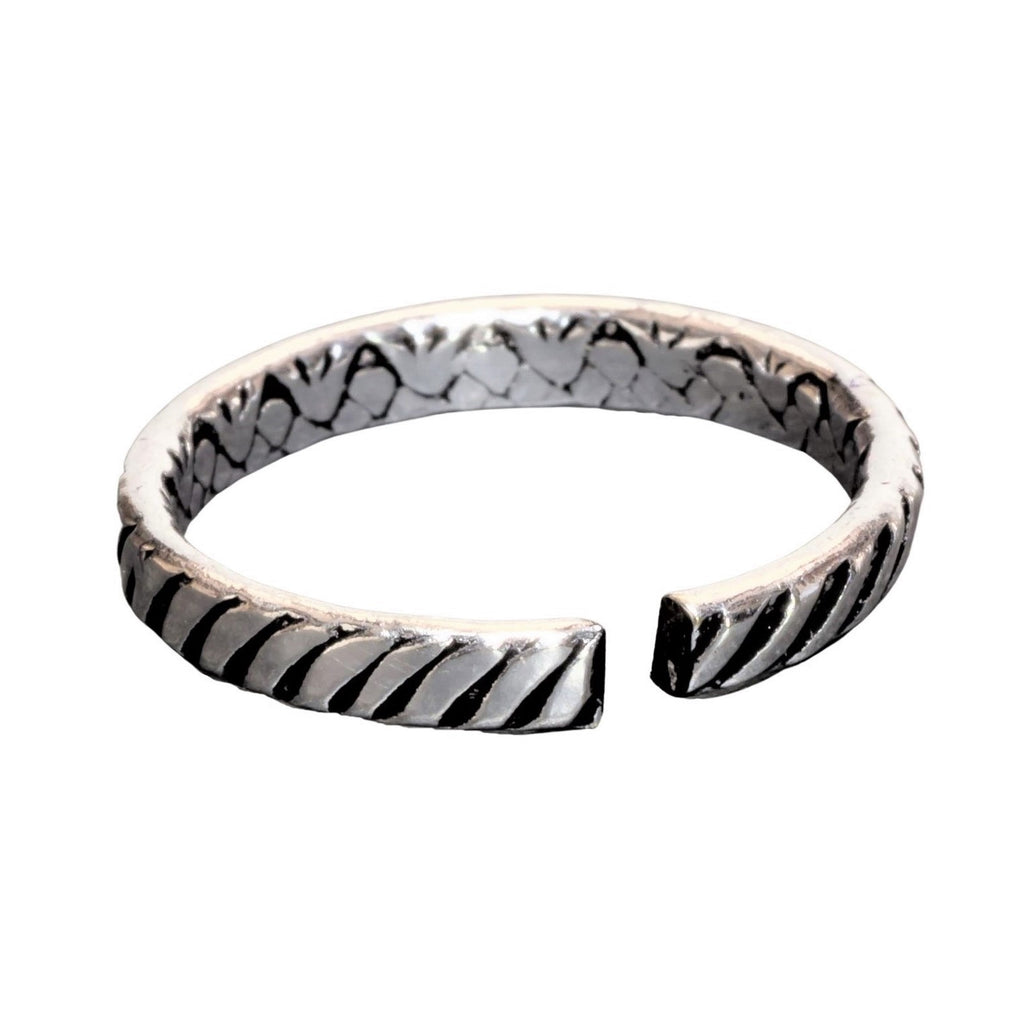 A handmade, adjustable, dainty solid silver striped patterned band toe ring designed by OMishka.