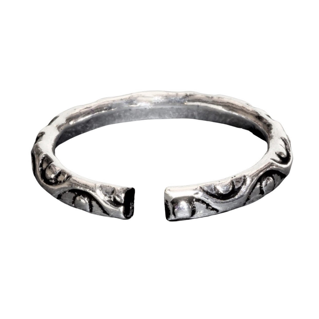 A handmade, adjustable, dainty solid silver dotted and swirl patterned band toe ring designed by OMishka.