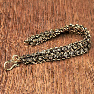 Handmade golden toned brass, decorative disc Banjara chainmail bracelet designed by OMishka.