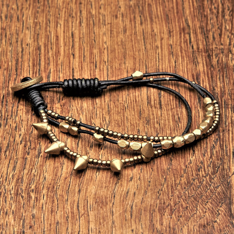 Handmade pure brass beaded, spike charm and black cord dainty bracelet designed by OMishka.