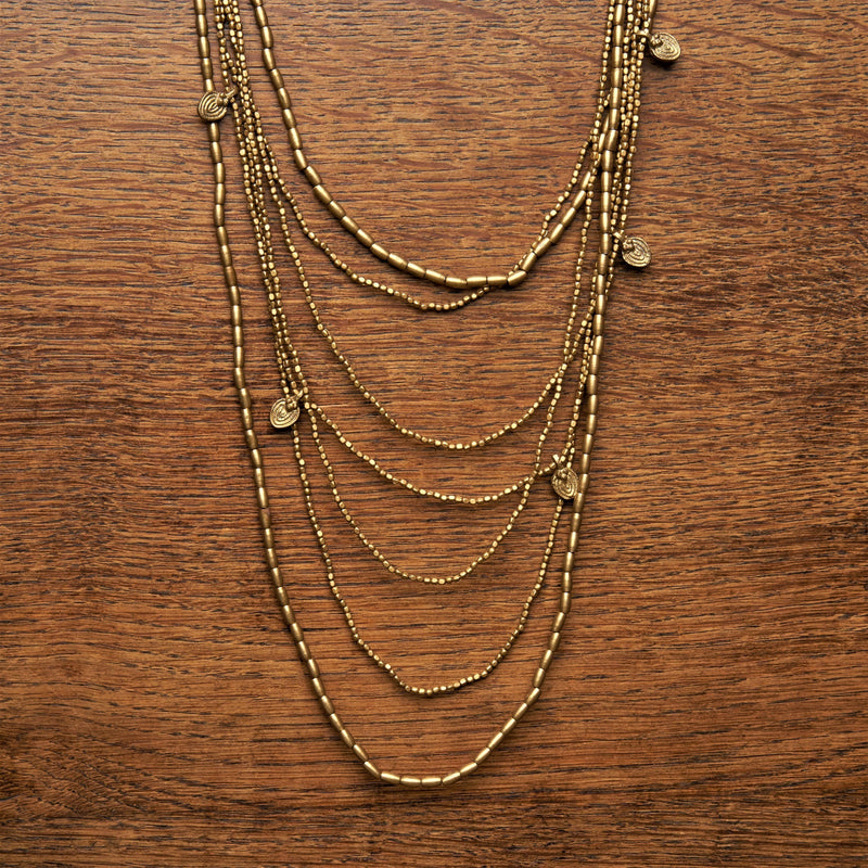 Handmade pure brass, tiny cube and barrel beaded, mini disc charm, layered multi strand necklace designed by OMishka.