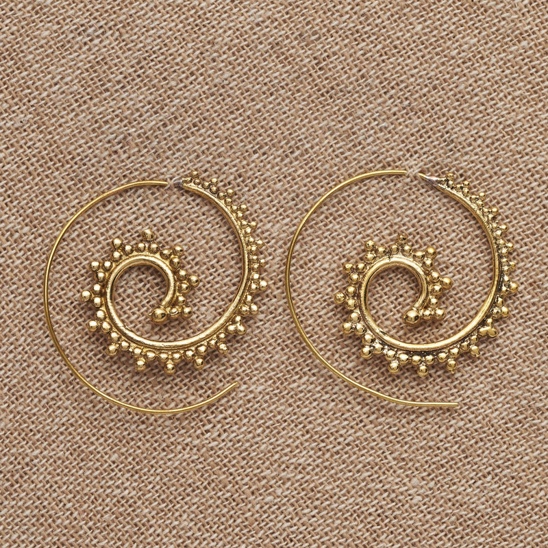 Handmade pure brass, dot beaded, large spiral hoop earrings designed by OMishka.