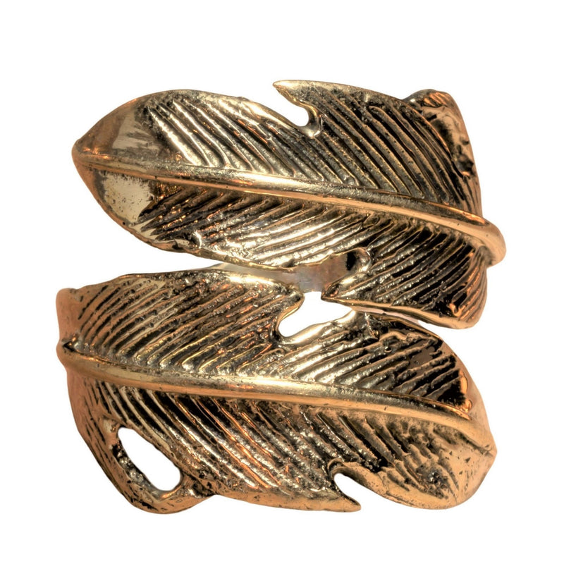 An adjustable, chunky, handmade pure brass, double feather wrap ring designed by OMishka.