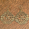 Handmade pure brass, large honeycomb drop earrings designed by OMishka.