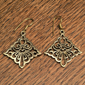 Handmade pure brass, rhombus shaped, filigree floral cut out dangle earrings designed by OMishka.