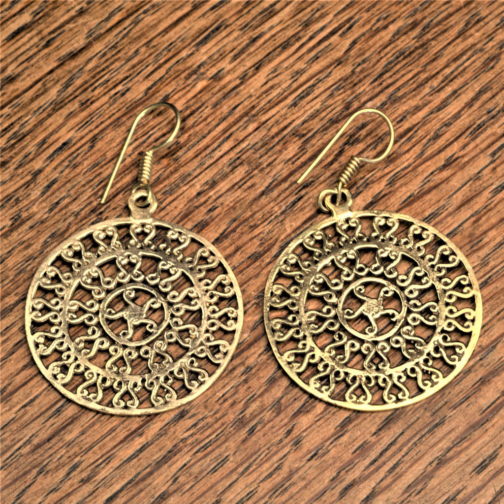 Handmade pure brass, swirling flame sun mandala, disc drop earrings designed by OMishka.