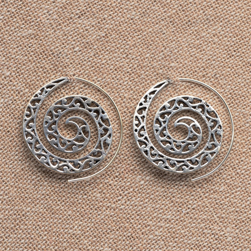 Large, handmade solid silver, ornate tribal inspired, spiral hoop earrings designed by OMishka.