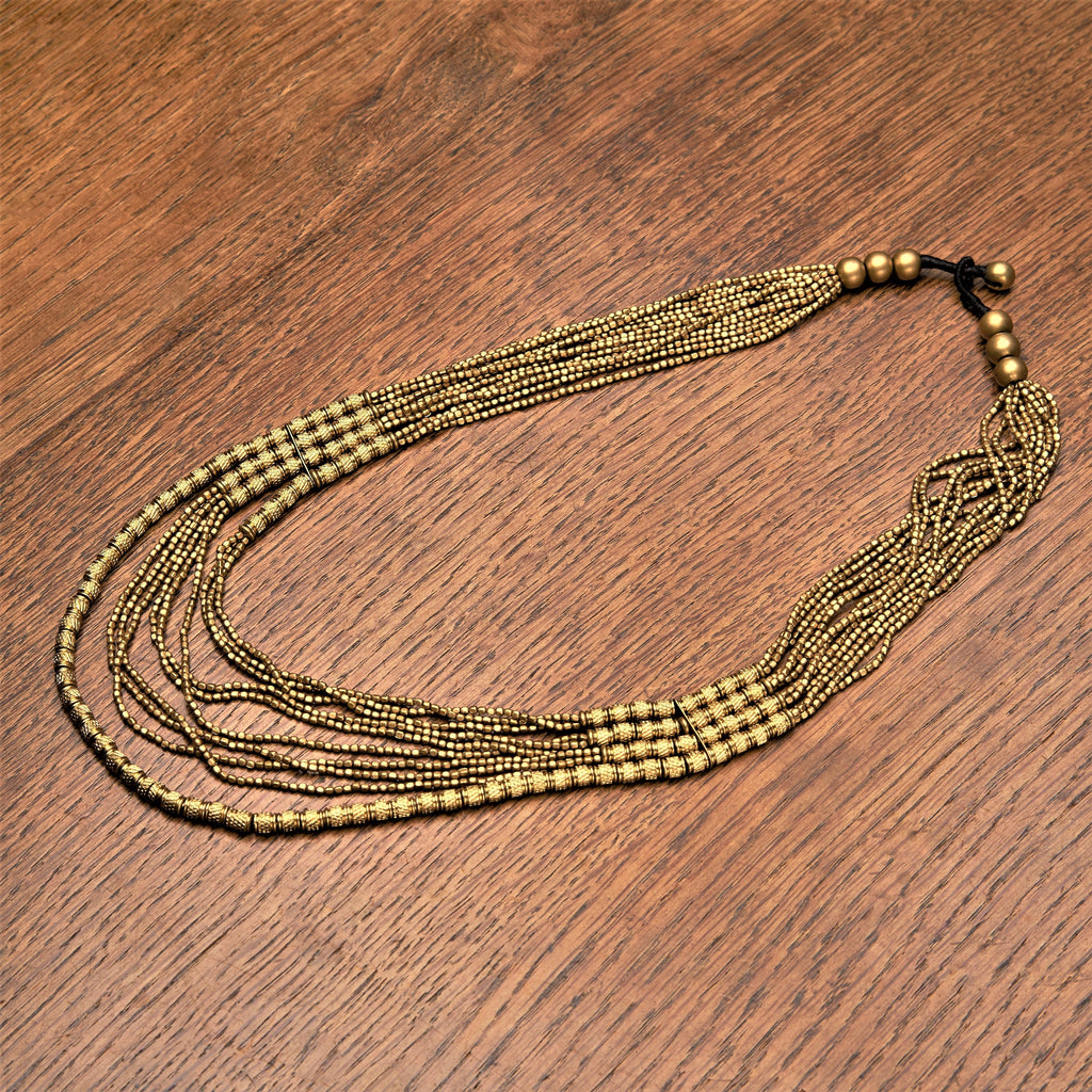 Handmade, golden brass etched beaded, layered multi strand necklace designed by OMishka.