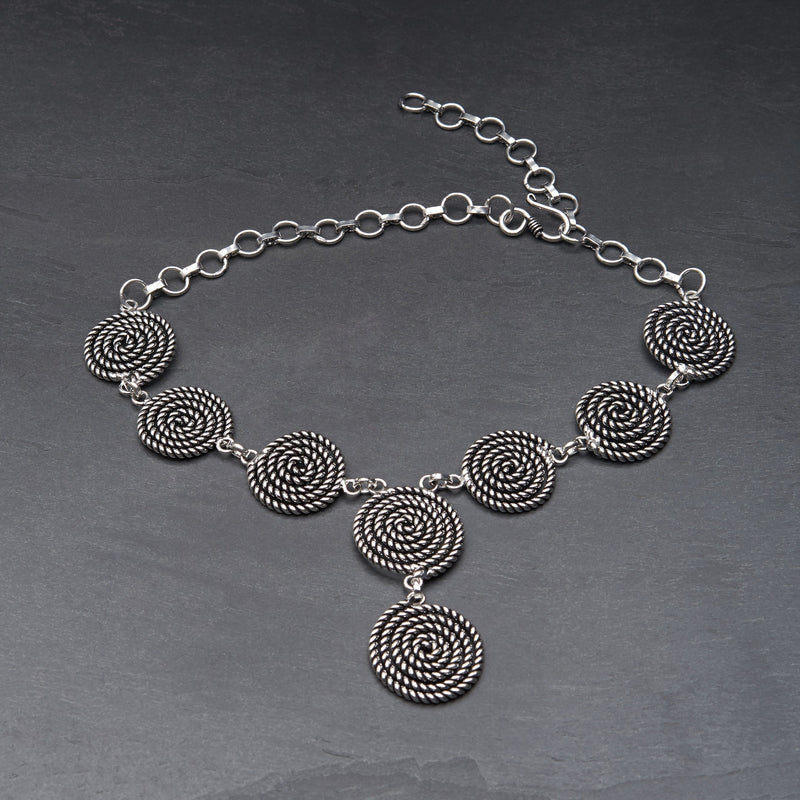 Handmade nickel free silver toned brass, coiled rope spiral detail, adjustable drop necklace designed by OMishka.