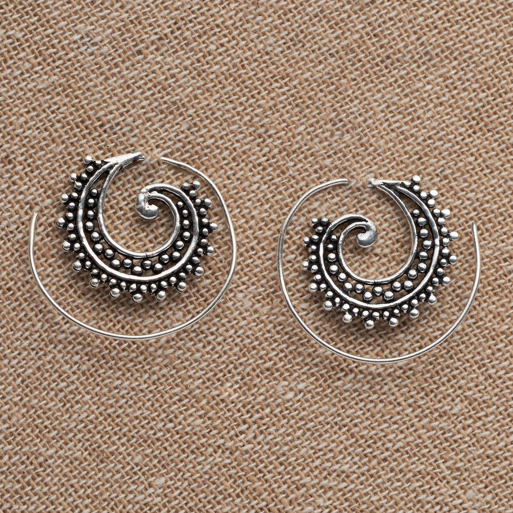 Handmade nickel free solid silver, dainty, decorative, dotted spiral hoop earrings designed by OMishka.