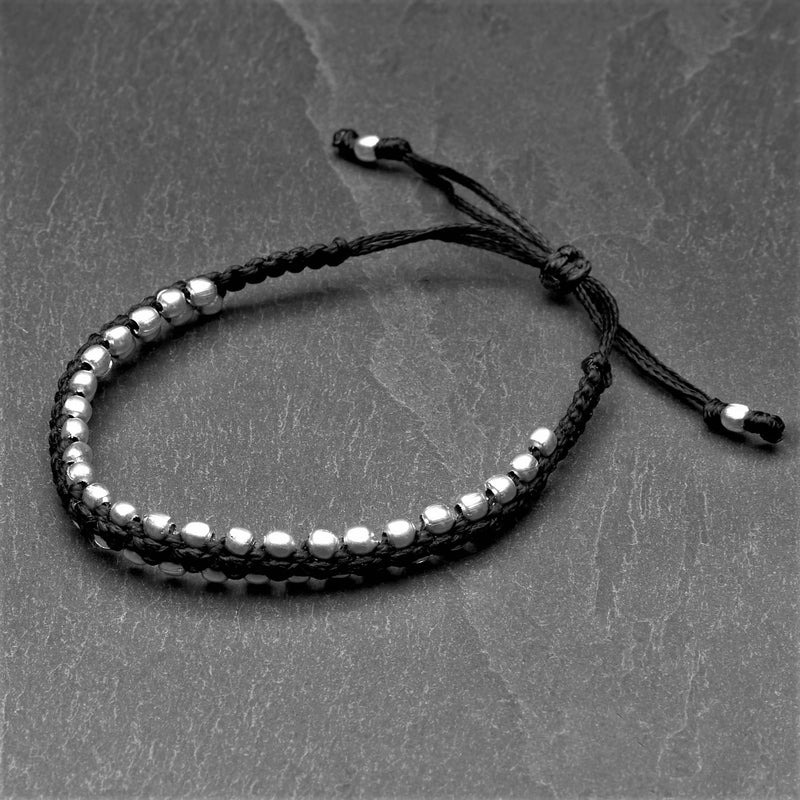 Handmade silver beaded, woven black cord adjustable drawstring, dainty bracelet designed by OMishka.
