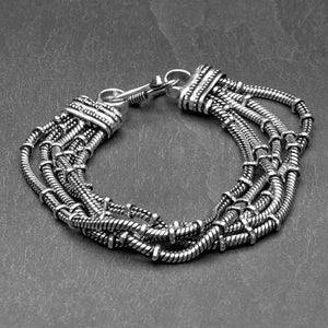 Handmade silver toned white metal, multi five strand, subtle beaded snake chain bracelet designed by OMishka.