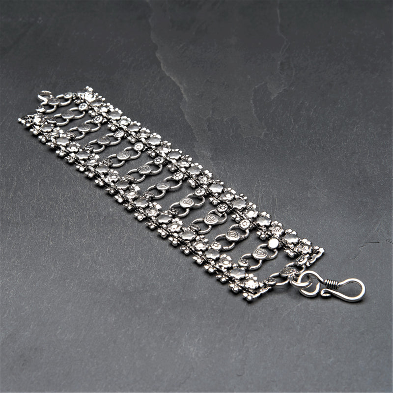 Handmade silver toned brass, decoratively patterned open circle, chunky chainmail bracelet designed by OMishka.
