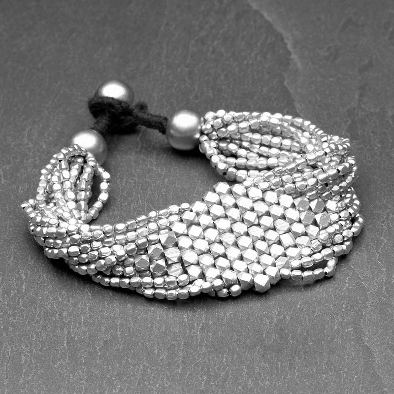 Handmade silver, elegantly beaded diamond cut, multi strand bracelet designed by OMishka.