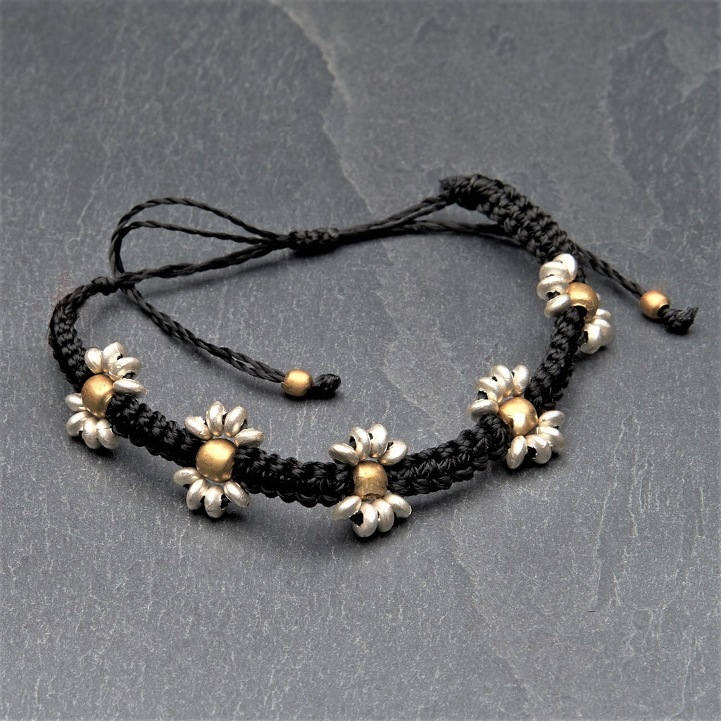 Handmade silver beaded flower, black woven macrame, dainty adjustable bracelet designed by OMishka.