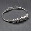 Handmade silver toned brass, solid and twisted beaded, snake chain bracelet designed by OMishka.